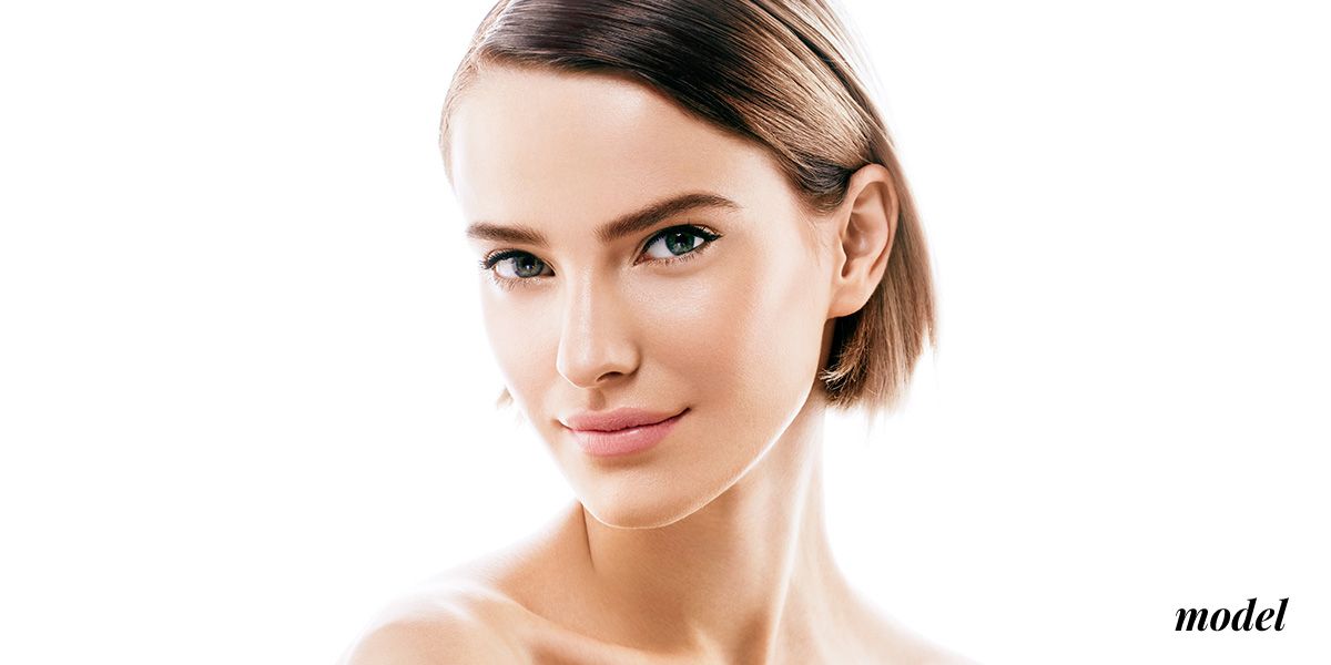 Model with natural makeup and flawless skin.