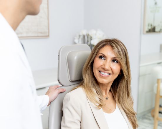 Beverly Hills plastic surgeon consulting with a patient