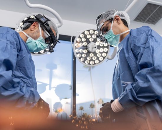 Dr. Nima Shemirani and Dr. Keon Parsa in the operating room