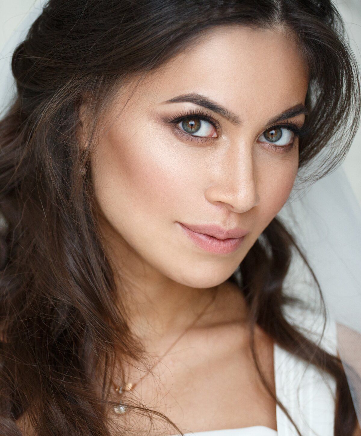 Portrait of a woman with flowing hair.