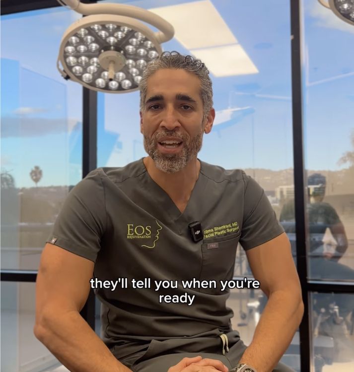 Doctor speaking in a medical office setting.